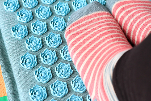 sitting-with-feet-on-pranamat